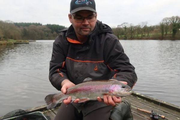 A beautiful rainbow trout caught on a booby in the dead of winter