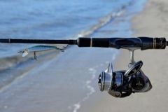 The equipment to fish with lure the sandy beaches