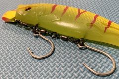 The steel cable is replaced by swivels and broken rings.